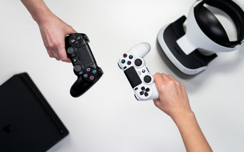 two-video-game-controllers